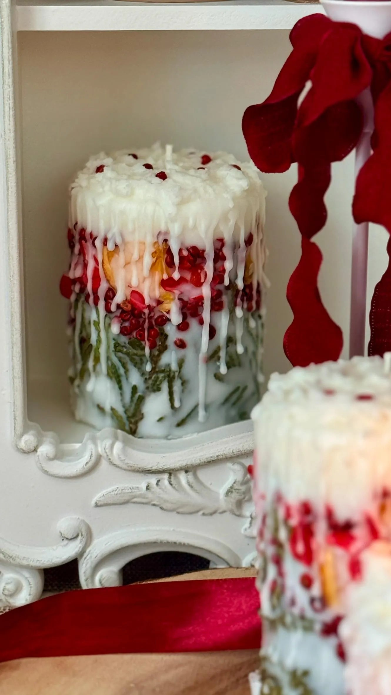 Christmas Candle: Rustic Holiday Decor with Fir Sprigs, Orange and Spices