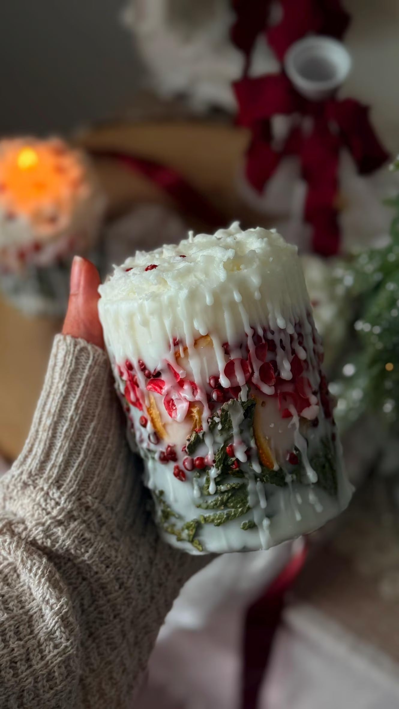 Christmas Candle: Rustic Holiday Decor with Fir Sprigs, Orange and Spices