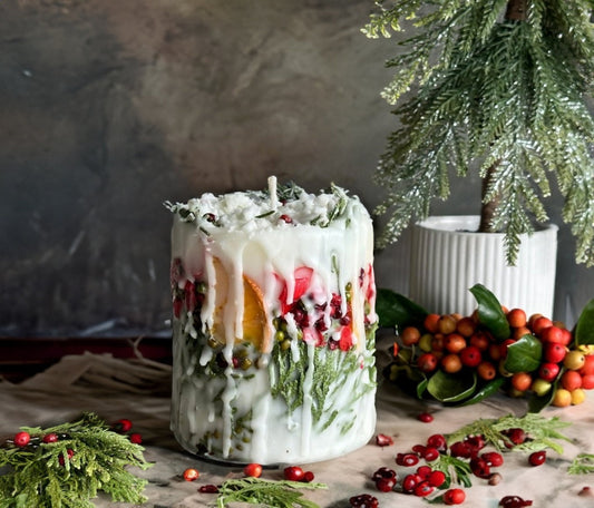 Christmas Candle: Rustic Holiday Decor with Fir Sprigs, Orange and Spices